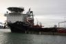 Het kraanschip  “SEAWAY STRASHNOV” van Gusto MSC   voor de wal in de Rotterdamse haven. De kraan aan boord kan 5000 ton tillen.
