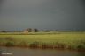 Naderende regenbui boven Friesland.