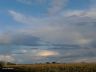 Wolkenlandschap boven maisvelden bij Goënga.