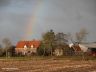 Opkomende regenboog boven Goënga.