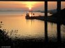 Zonsondergang bij de Langweerderwielen. Foto genomen vanaf de oude weg tussen Joure en Sneek. De brug ligt in de nieuwe weg Sneek-Joure.